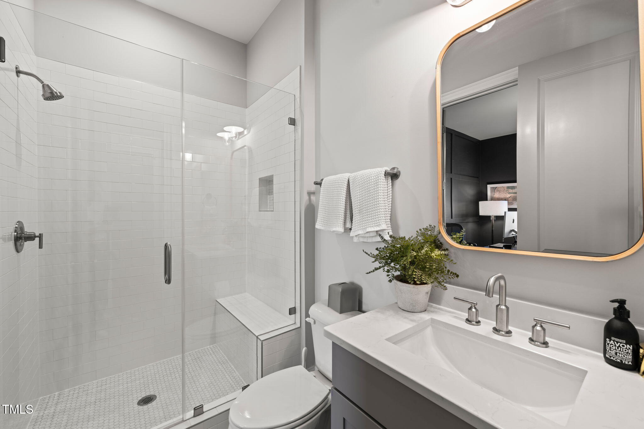 2105 Gardenbrook Drive Raleigh, NC 27606 - Photo 29 of 86 a bathroom with a sink toilet and shower