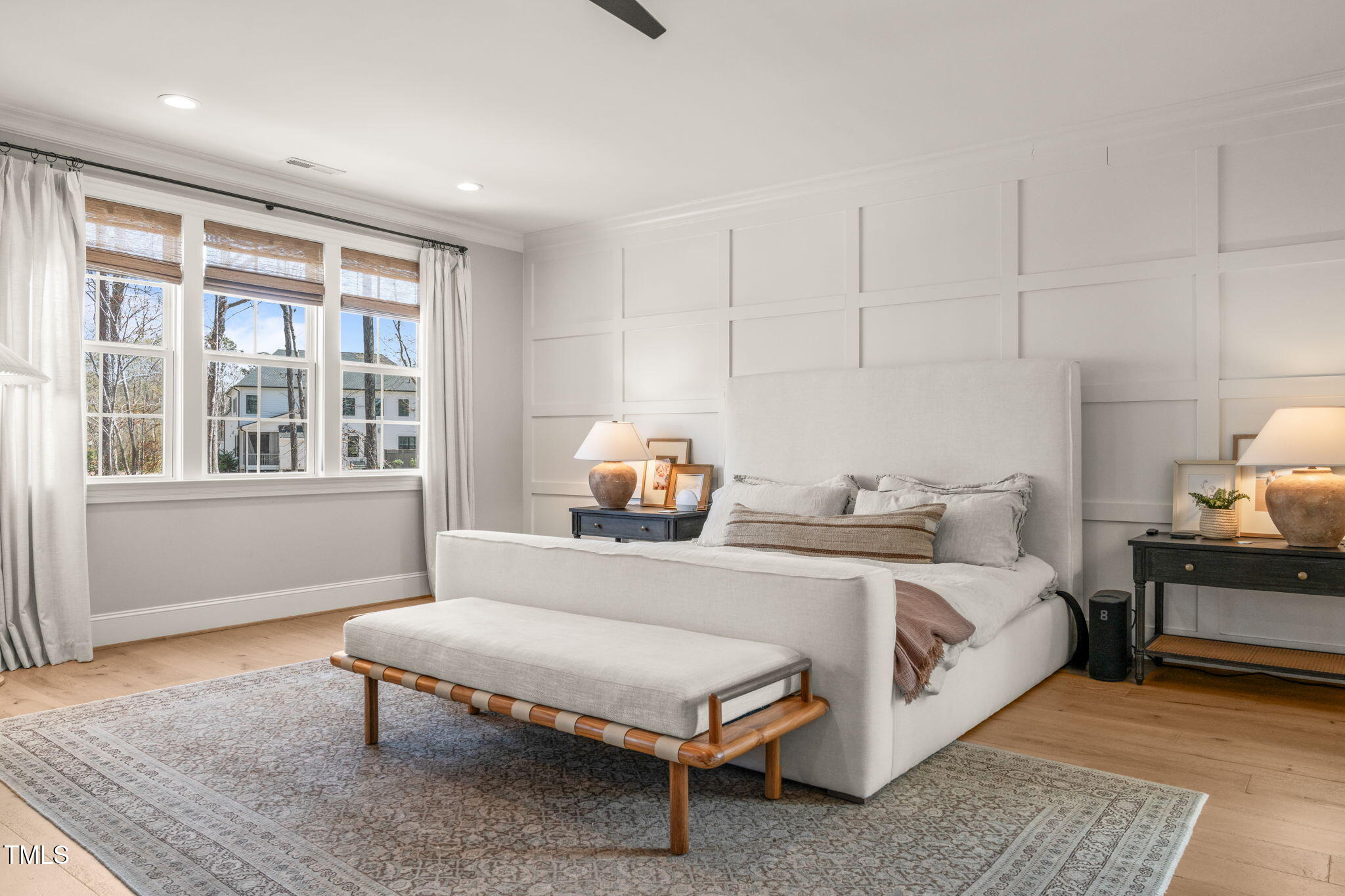 2105 Gardenbrook Drive Raleigh, NC 27606 - Photo 35 of 86 a bedroom with a bed and wooden floor