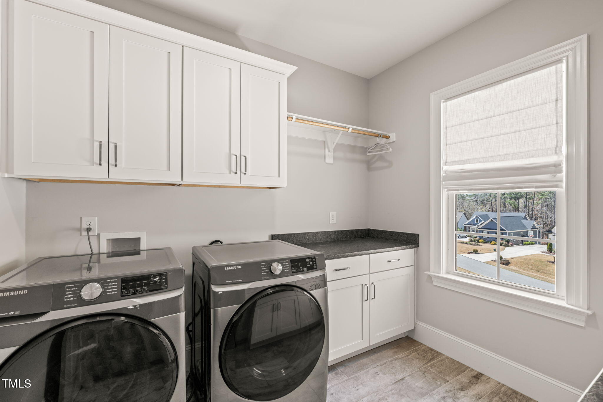 2105 Gardenbrook Drive Raleigh, NC 27606 - Photo 41 of 86 a utility room with sink dryer and washer