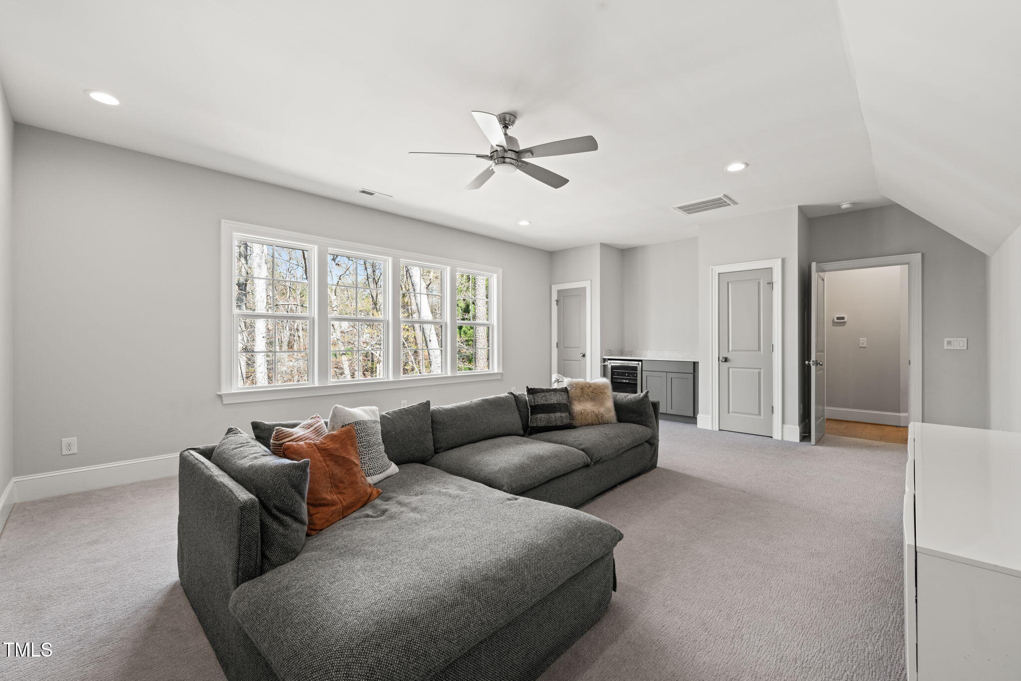 2105 Gardenbrook Drive Raleigh, NC 27606 - Photo 51 of 86 a living room with furniture and windows
