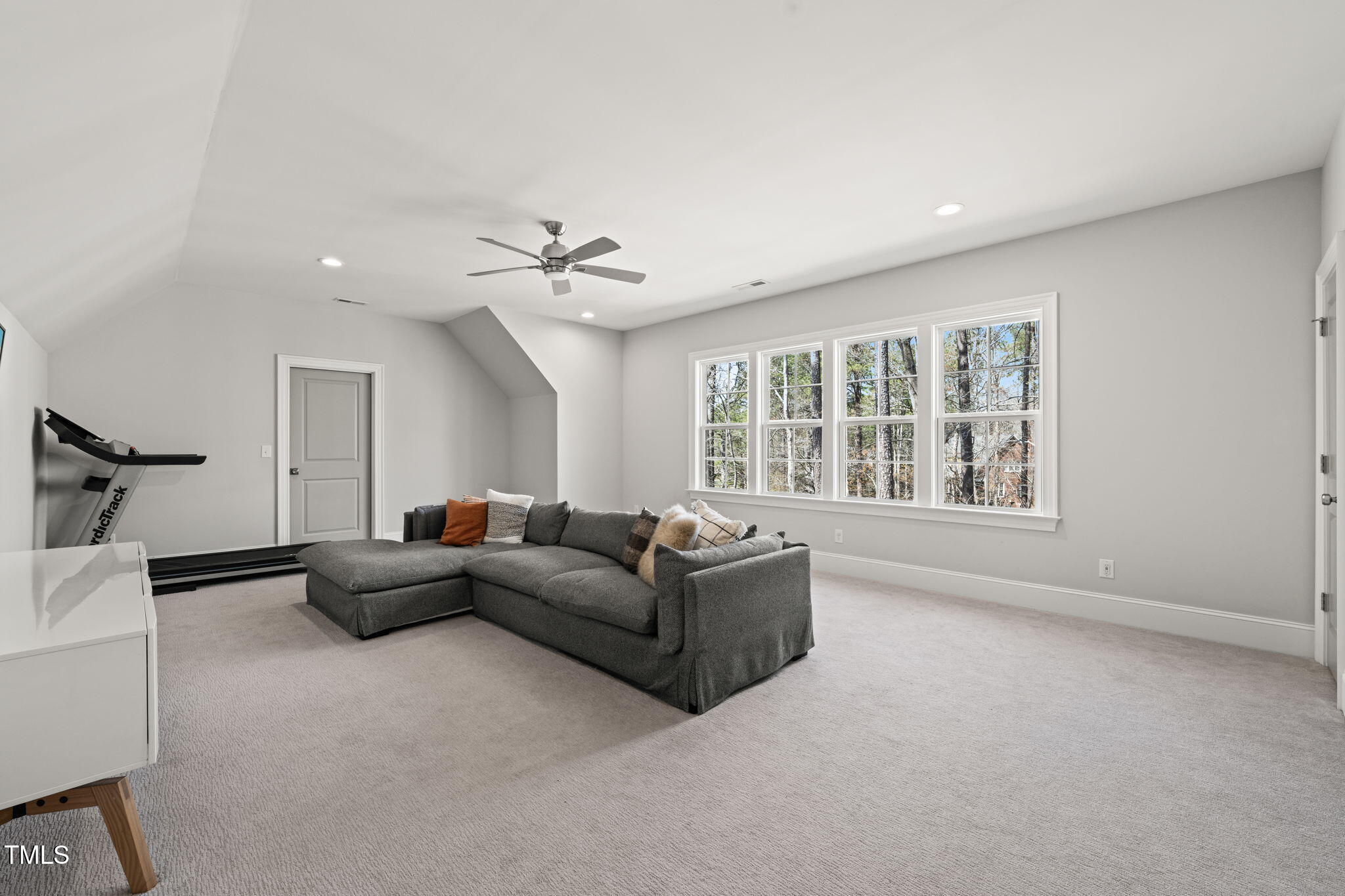 2105 Gardenbrook Drive Raleigh, NC 27606 - Photo 52 of 86 a living room with furniture and a window