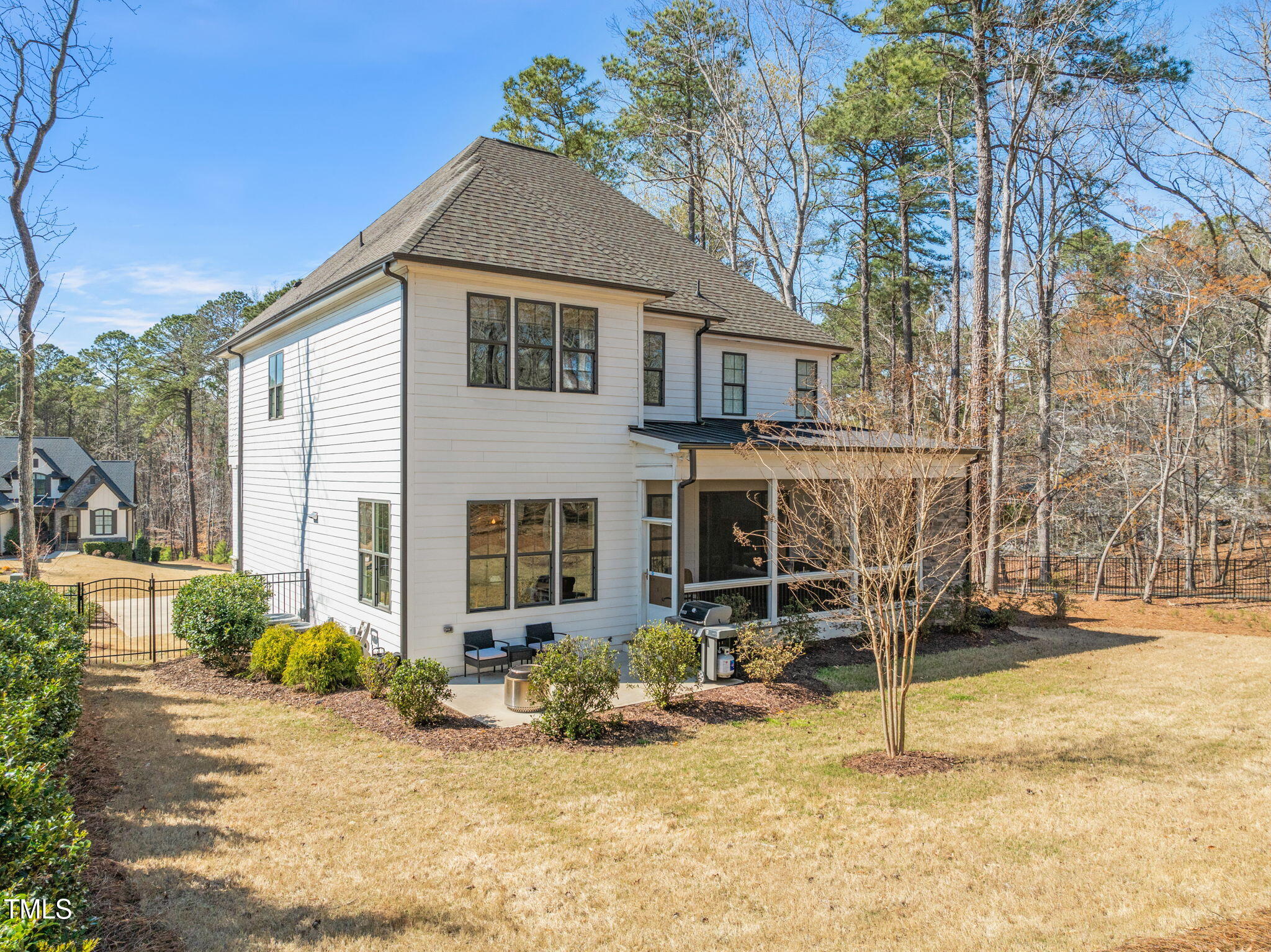 2105 Gardenbrook Drive Raleigh, NC 27606 - Photo 60 of 86 a view of a house with backyard porch and sitting area