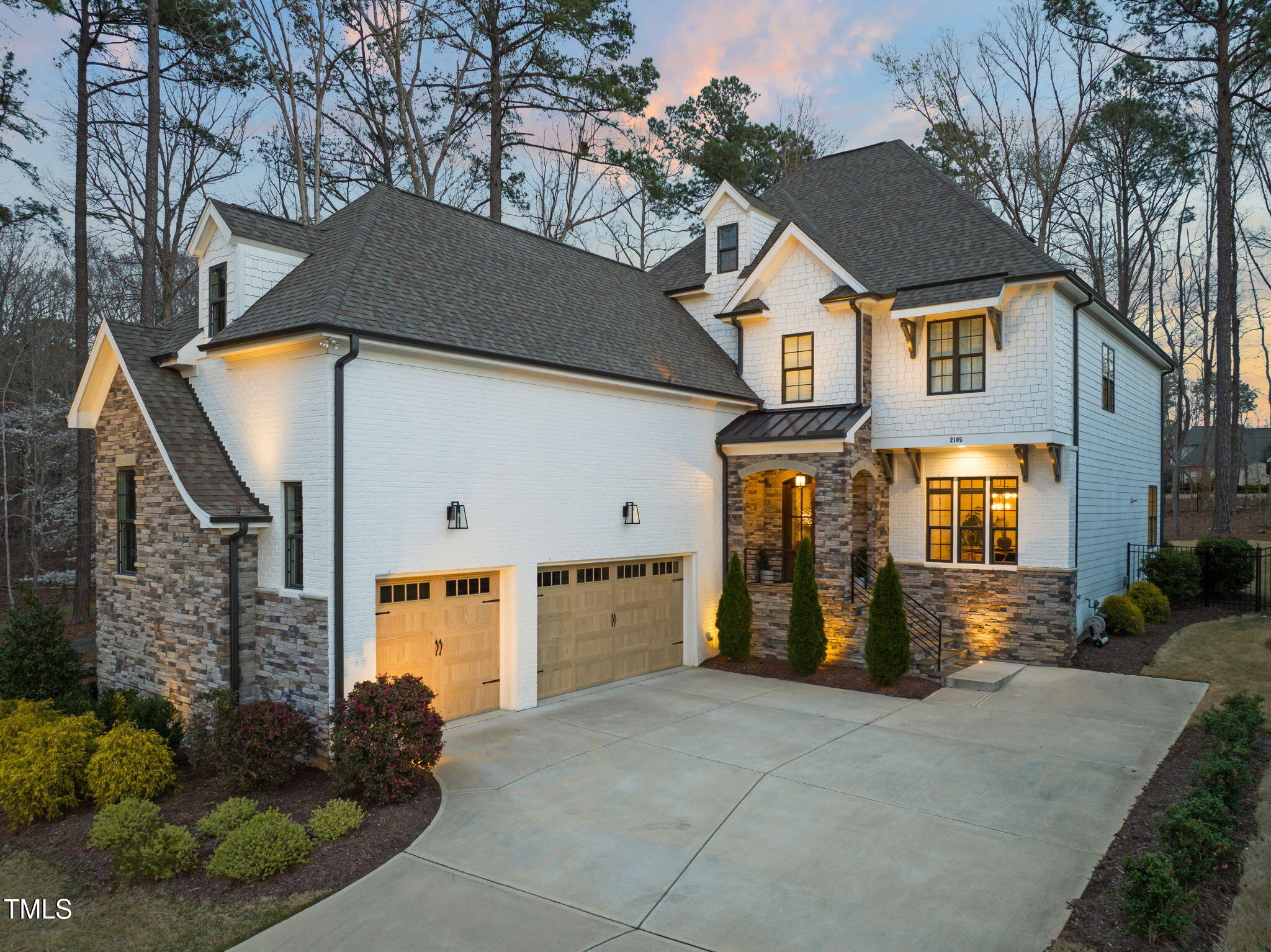 2105 Gardenbrook Drive Raleigh, NC 27606 - Photo 75 of 86 a front view of a house with a yard