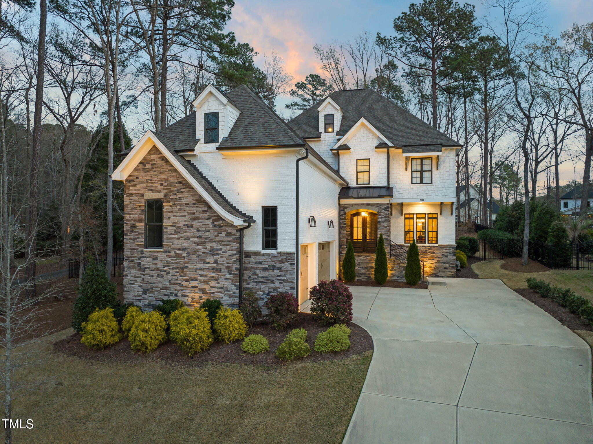 2105 Gardenbrook Drive Raleigh, NC 27606 - Photo 76 of 86 a front view of a house with garden