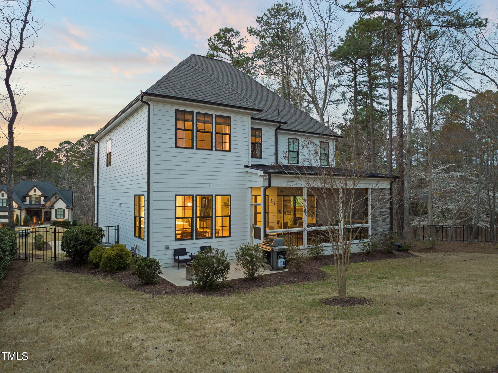 2105 Gardenbrook Drive Raleigh, NC 27606 - Photo 78 of 86 a front view of a house with garden