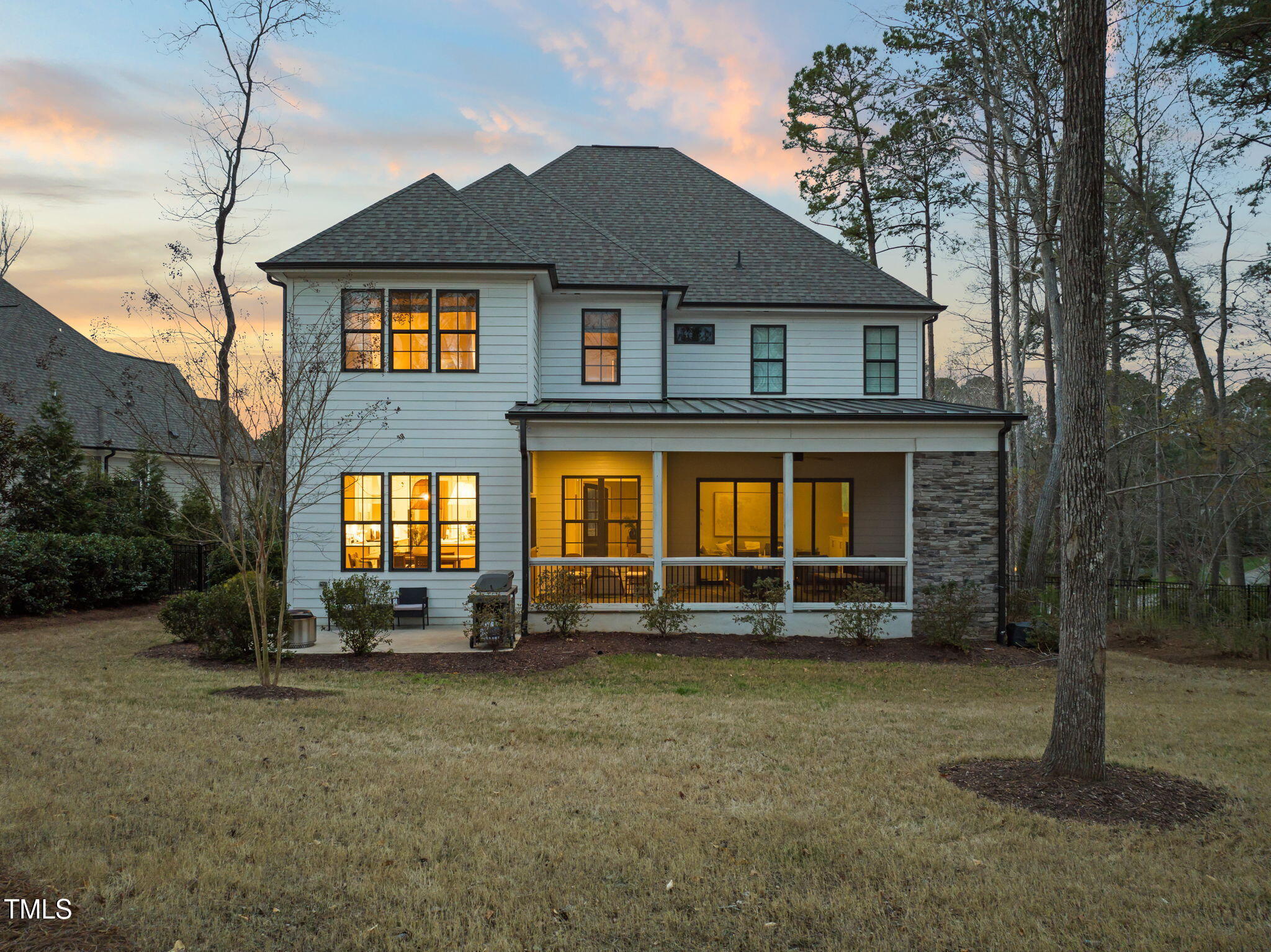 2105 Gardenbrook Drive Raleigh, NC 27606 - Photo 79 of 86 a front view of a house with a yard