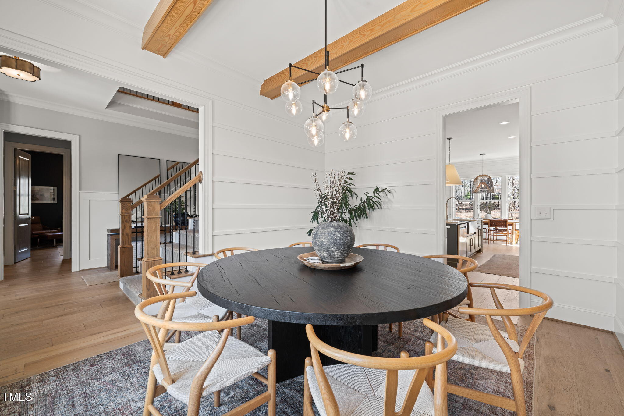 2105 Gardenbrook Drive Raleigh, NC 27606 - Photo 7 of 86 a view of a dining room with furniture and wooden floor