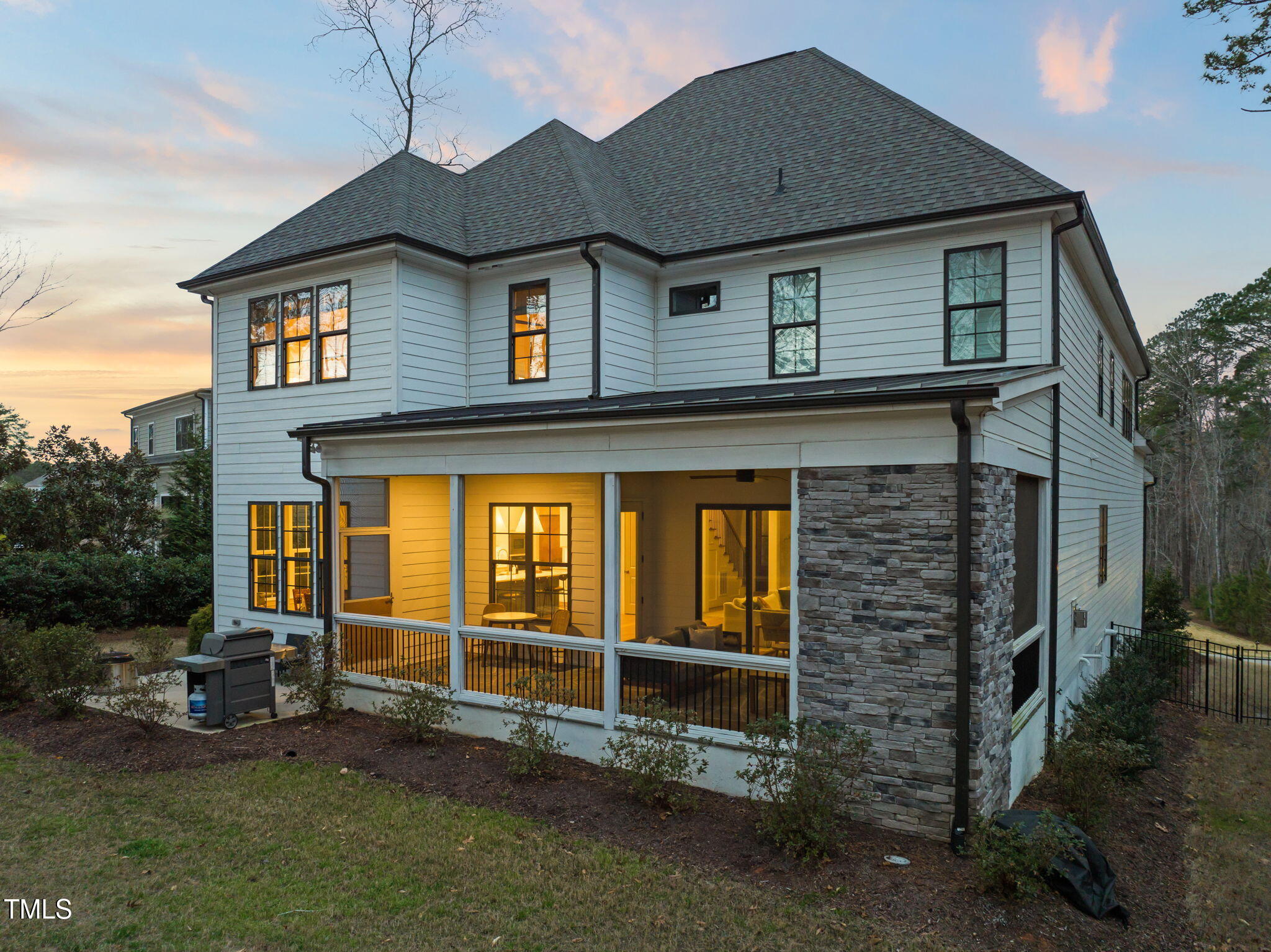 2105 Gardenbrook Drive Raleigh, NC 27606 - Photo 80 of 86 a front view of a house with a yard
