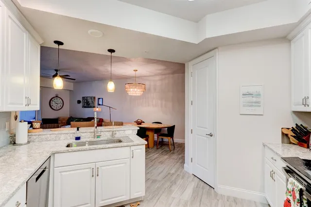 a very nice looking room with a chair and a clock