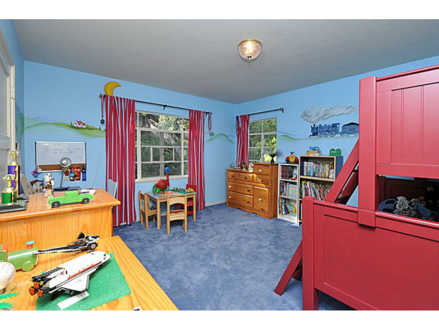 259 Bridge Road Hillsborough, CA 94010 - Photo 14 of 23 a room with furniture and a flat screen tv