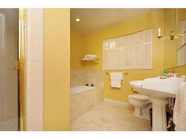 259 Bridge Road Hillsborough, CA 94010 - Photo 17 of 23 a bathroom with a sink a toilet and shower