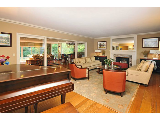259 Bridge Road Hillsborough, CA 94010 - Photo 5 of 23 a living room with furniture and a floor to ceiling window