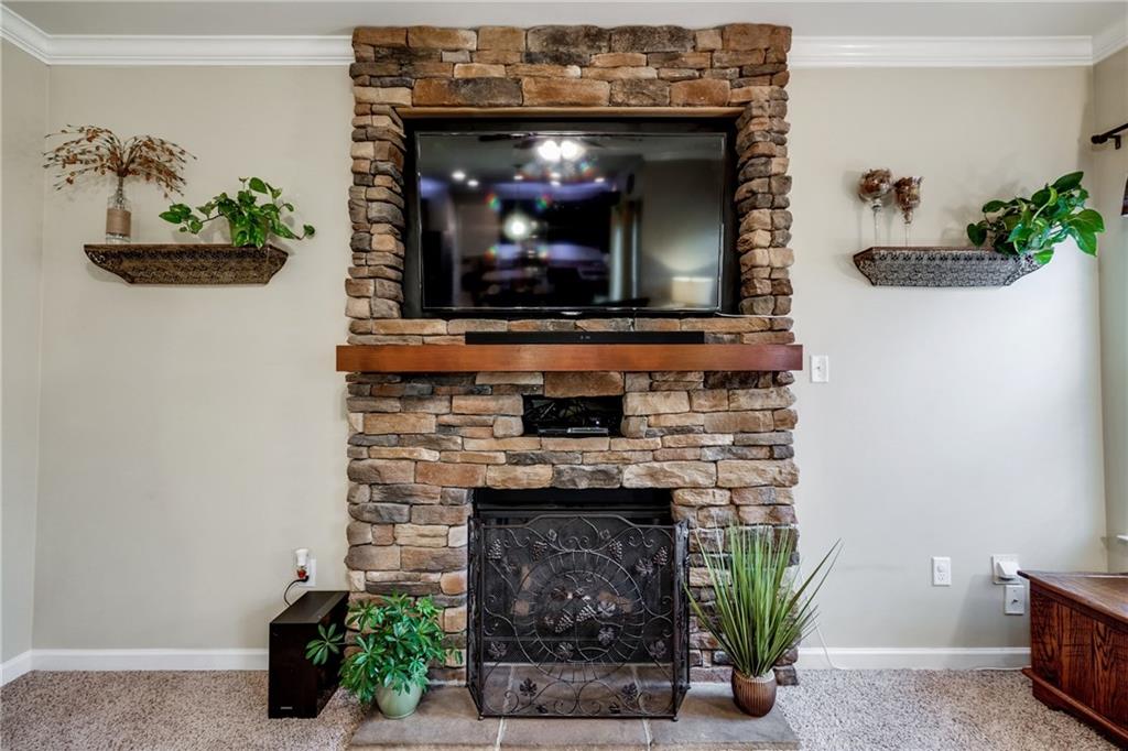 2018 Eagle Ridge Drive Valencia, PA 16059 - Photo 3 of 25 The stunning stone gas fireplace is the focal point of the family room.