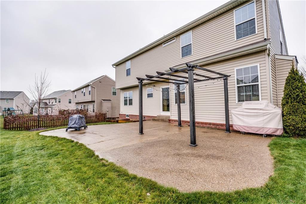 2018 Eagle Ridge Drive Valencia, PA 16059 - Photo 24 of 25 The large exposed aggregate patio with pergola, overlooking the large yard, is perfect for your summer cookouts!