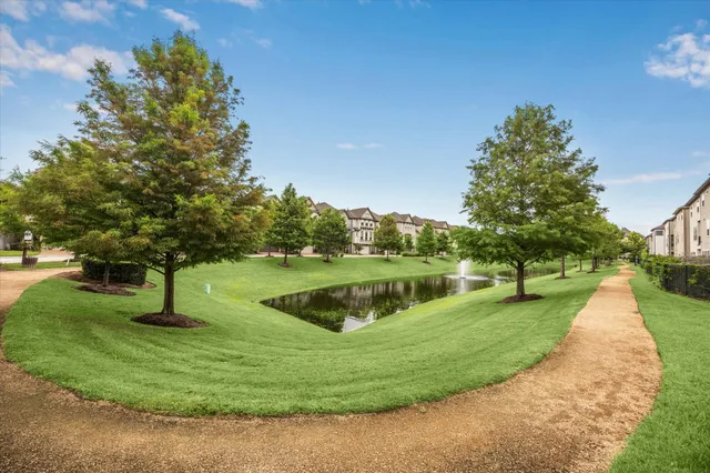 a view of a lake view with a garden