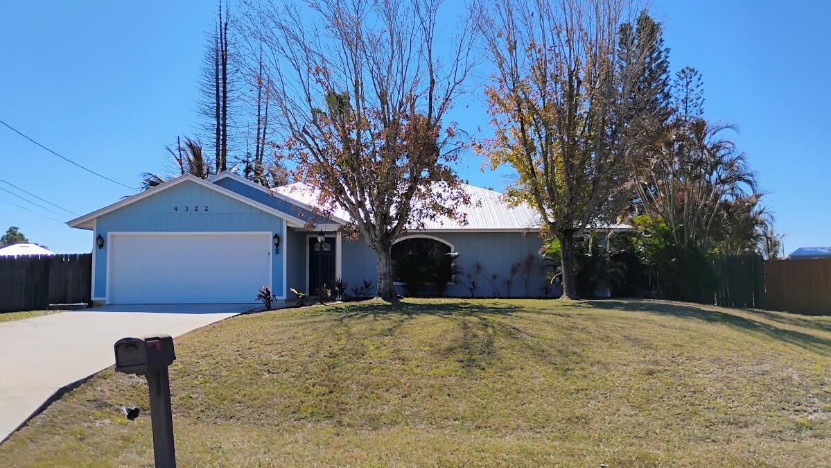 4322 Southwest Jarmer Road Port St. Lucie, FL 34953 - Photo 1 of 27 Front
