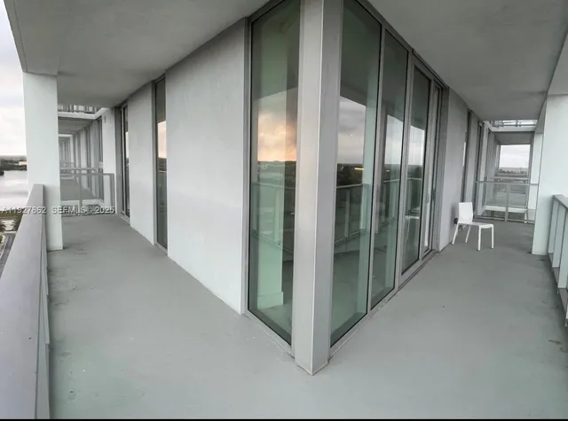 a view of gallery with windows