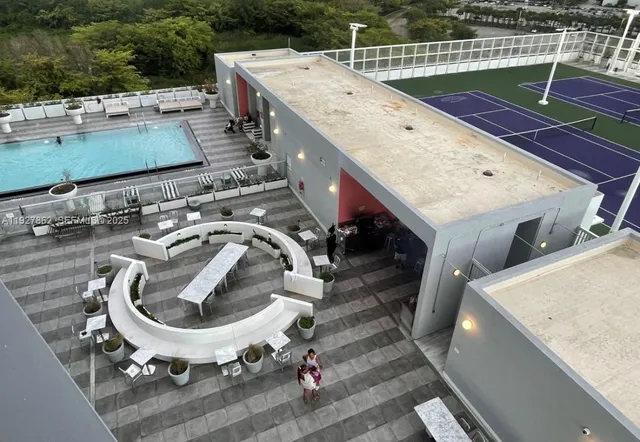 a view of a swimming pool with a patio