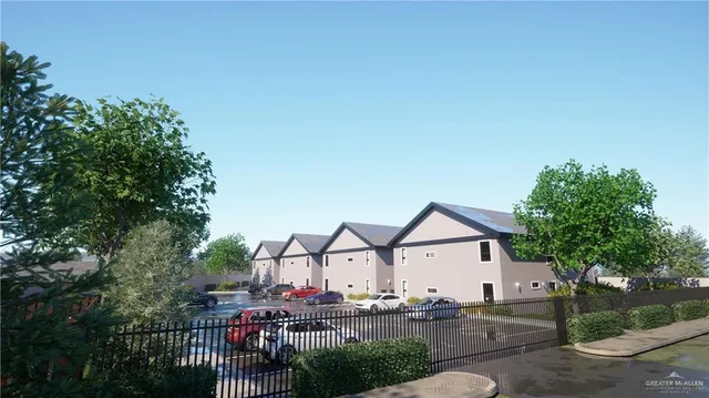 a view of house with outdoor space and sitting area