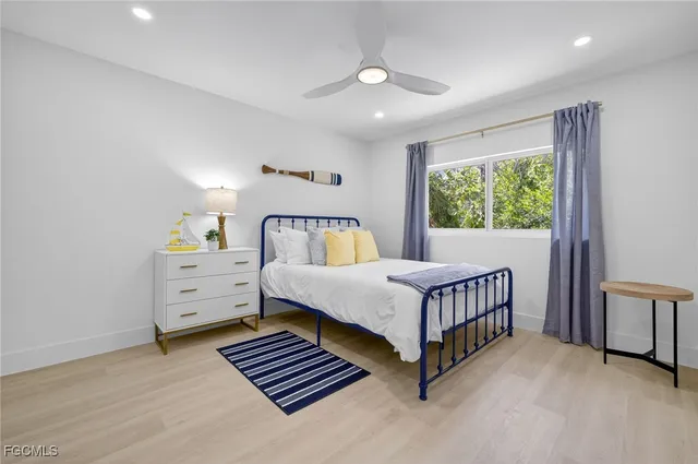 a bedroom with furniture and windows