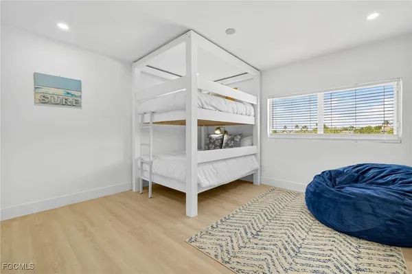 a living room with a bed and a couch