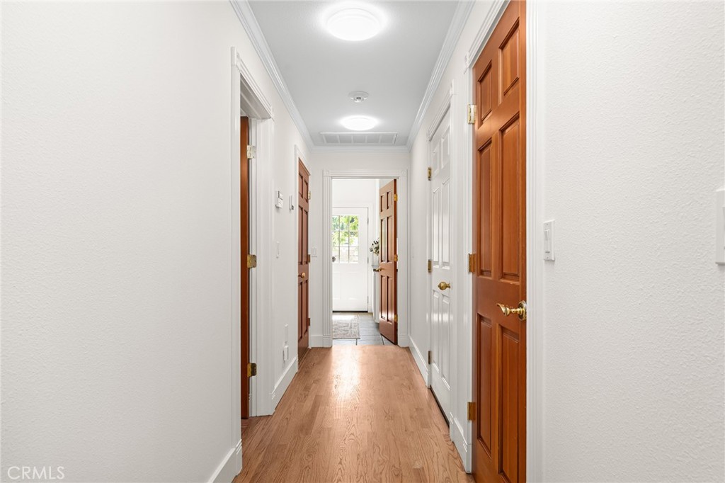 897 Filbert Avenue Chico, CA 95926 - Photo 26 of 66 a view of a hallway with wooden floor