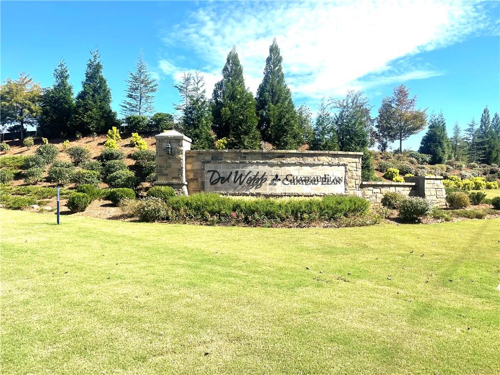 5709 Grapewood Street Hoschton, GA 30548 - Photo 45 of 65 a view of a yard with an outdoor space