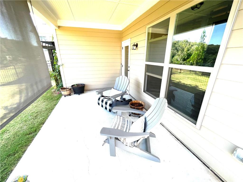 5709 Grapewood Street Hoschton, GA 30548 - Photo 48 of 65 a view of balcony with furniture