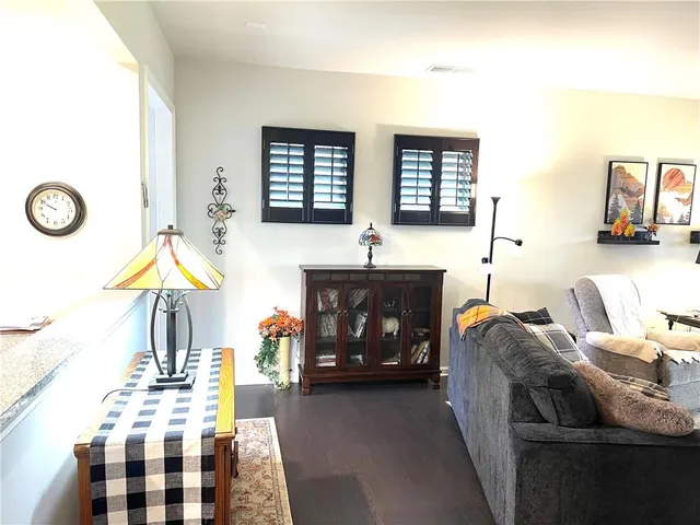 a kitchen with a sink appliances and cabinets