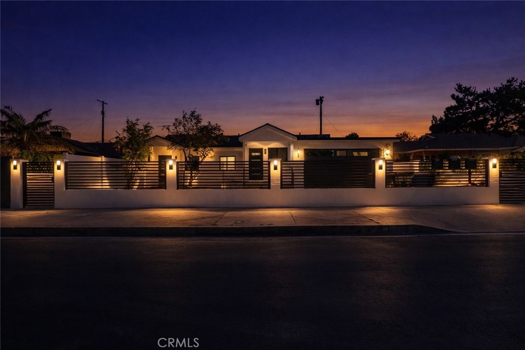 19928 Hatton Street Winnetka, CA 91306 - Photo 15 of 15 a front view of a house with garden