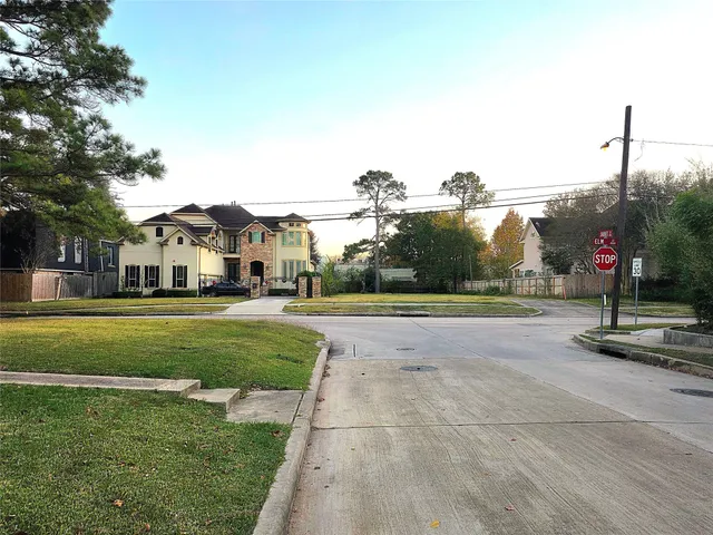 a view of backyard with green space