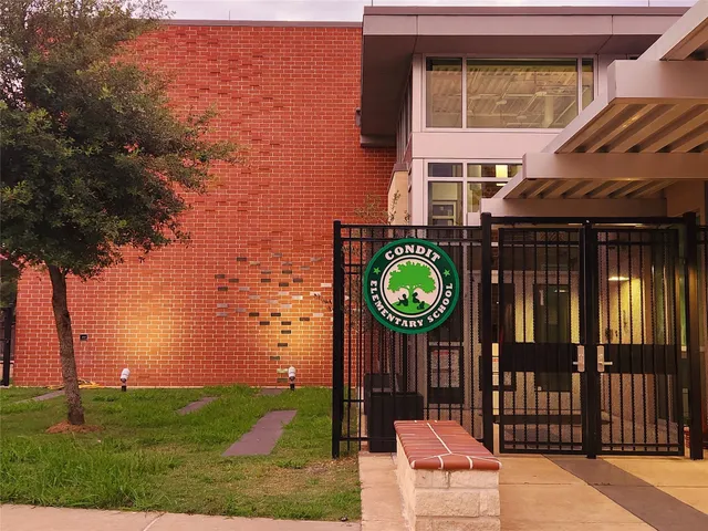a view of city with tall buildings