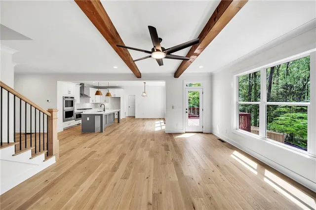 a kitchen with granite countertop cabinets and steel stainless steel appliances