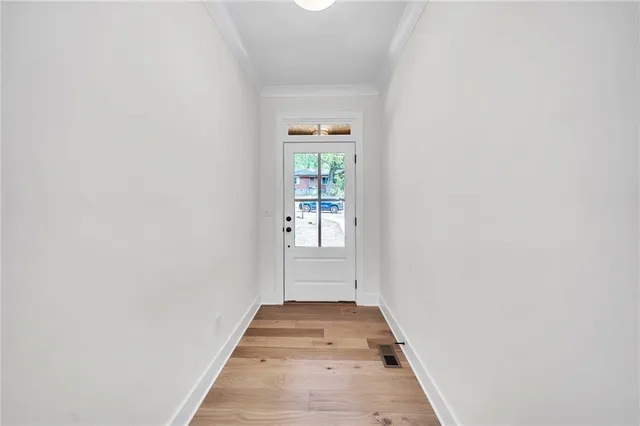 a kitchen with a stove and a refrigerator