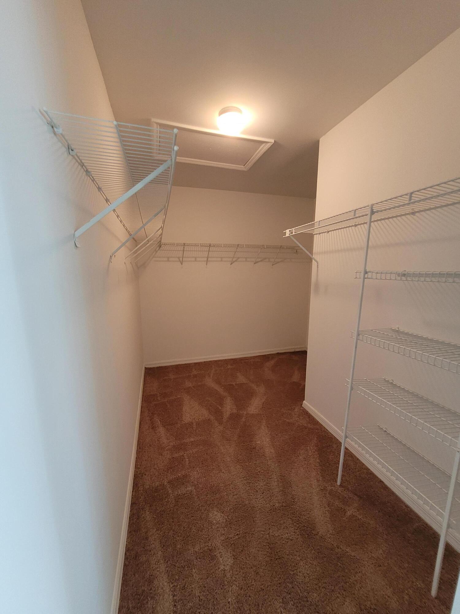 22260 Kettle Creek Way Boca Raton, FL 33428 - Photo 15 of 39 Master bedroom walk-in closet