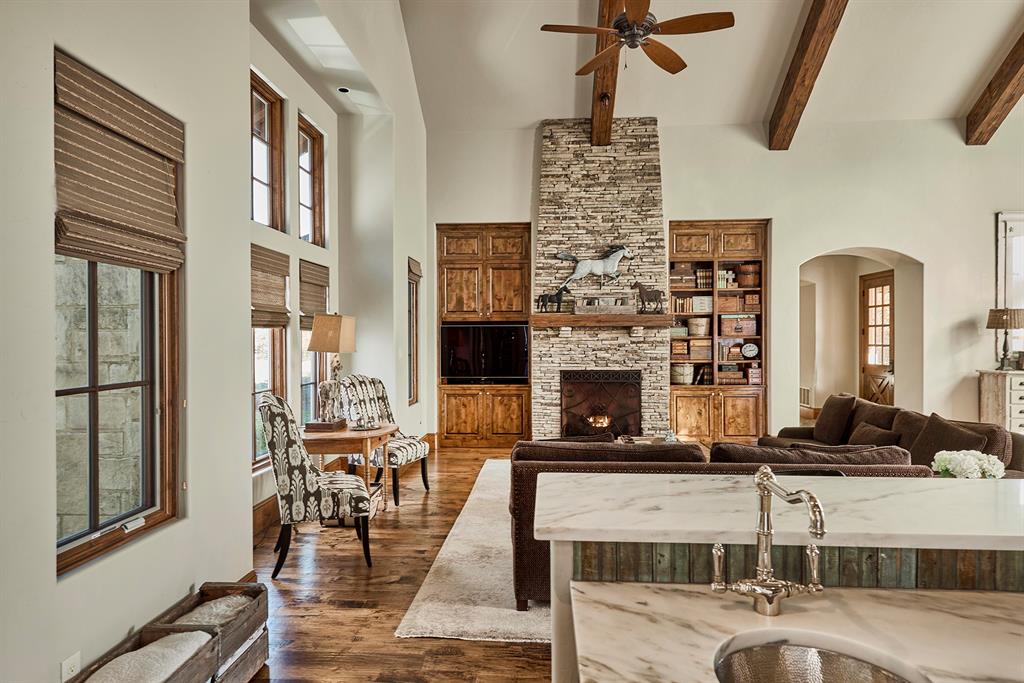 4951 Bridle Bit Road Flower Mound, TX 75022 - Photo 11 of 33 Isokern FP anchors the living area.