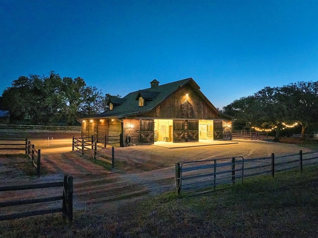 4951 Bridle Bit Road Flower Mound, TX 75022 - Photo 30 of 33 BarnPros barn at night.