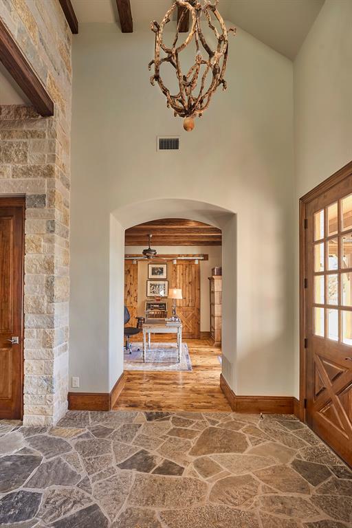 4951 Bridle Bit Road Flower Mound, TX 75022 - Photo 3 of 33 Welcoming foyer with custom chandelier