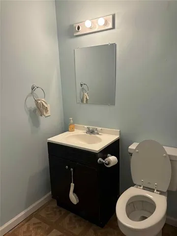 a view of a swimming pool with a yard