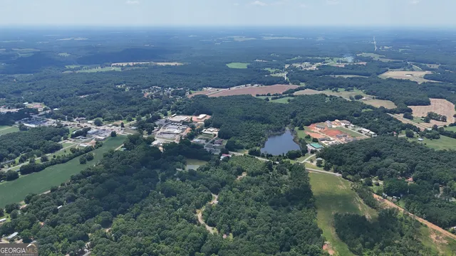 an aerial view of city and lake view