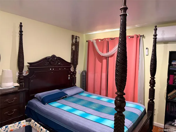 a room with lots of windows and a glass door