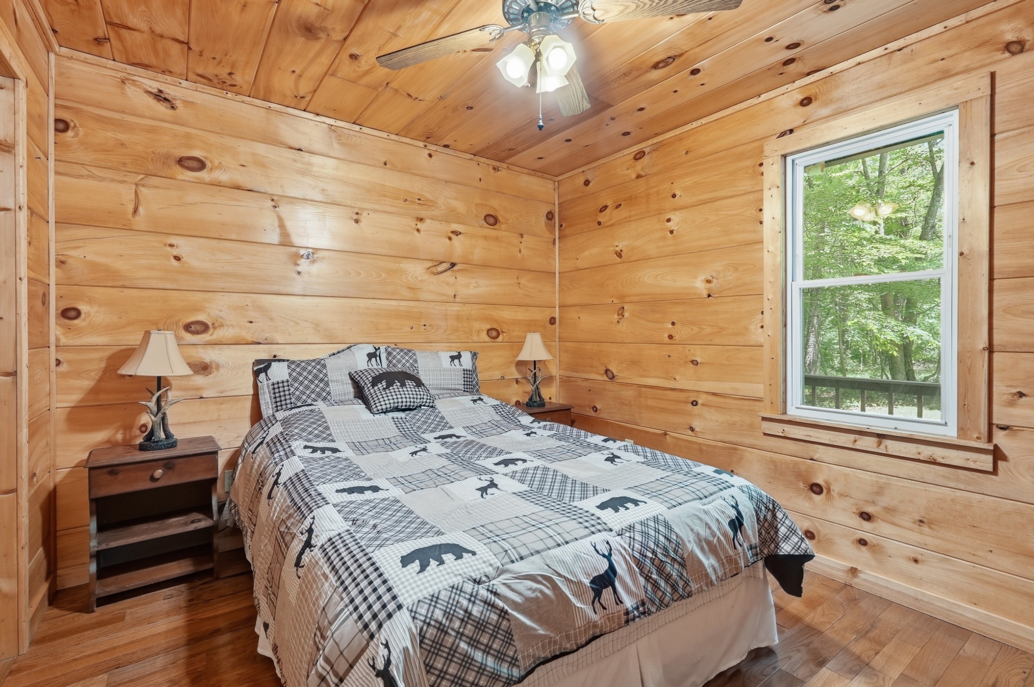 118 Cherokee Road Spencer, TN 38585 - Photo 14 of 85 a bed sitting in a bedroom next to a window