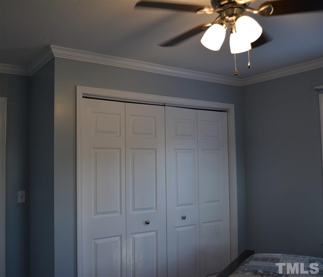 3056 Seven Paths Road Louisburg, NC 27549 - Photo 16 of 29 Master room still has the original closet, seller added additional closet. You would think the house was built this way.