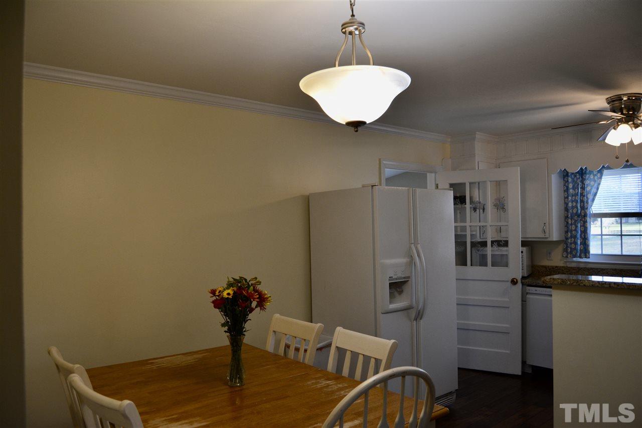 3056 Seven Paths Road Louisburg, NC 27549 - Photo 6 of 29 This dining room is open to the kitchen for all your family events.