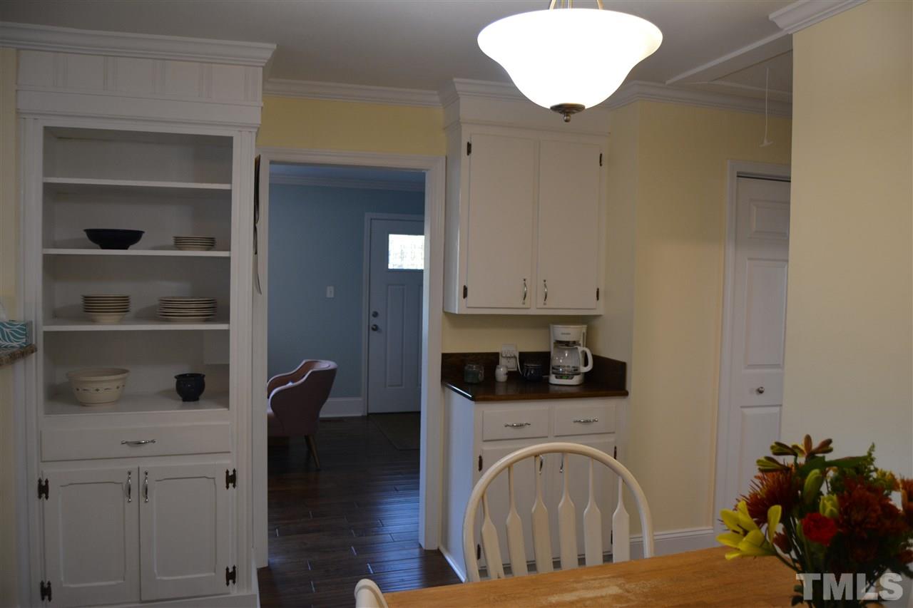 3056 Seven Paths Road Louisburg, NC 27549 - Photo 7 of 29 See some of the original features and a few custom.