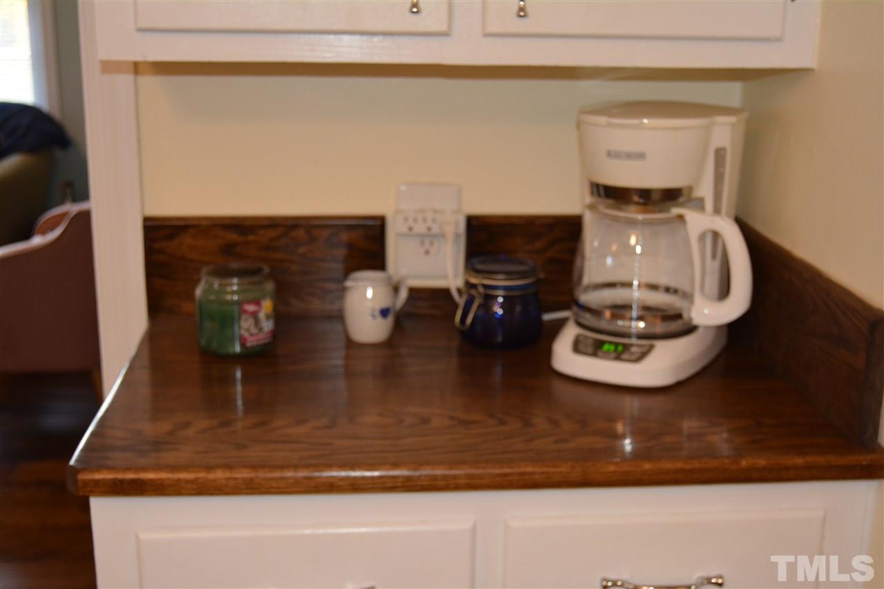 3056 Seven Paths Road Louisburg, NC 27549 - Photo 8 of 29 Custom counter top makes for a great coffee station.