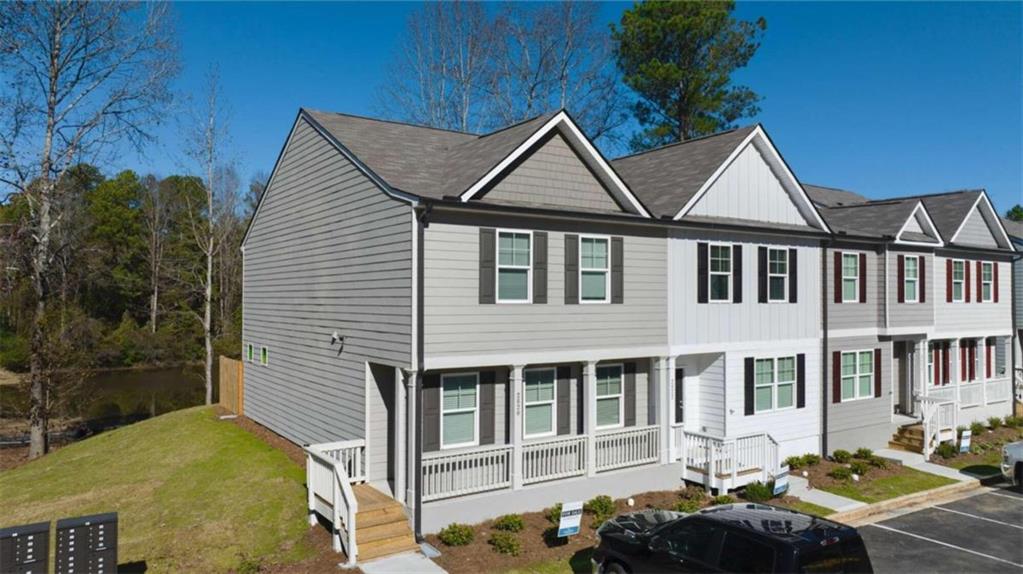 2820 Saratoga Lake View, Unit 1 Decatur, GA 30034 - Photo 1 of 1 a front view of a house with a yard