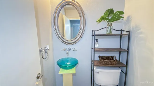 an empty room with a ceiling fan and a window