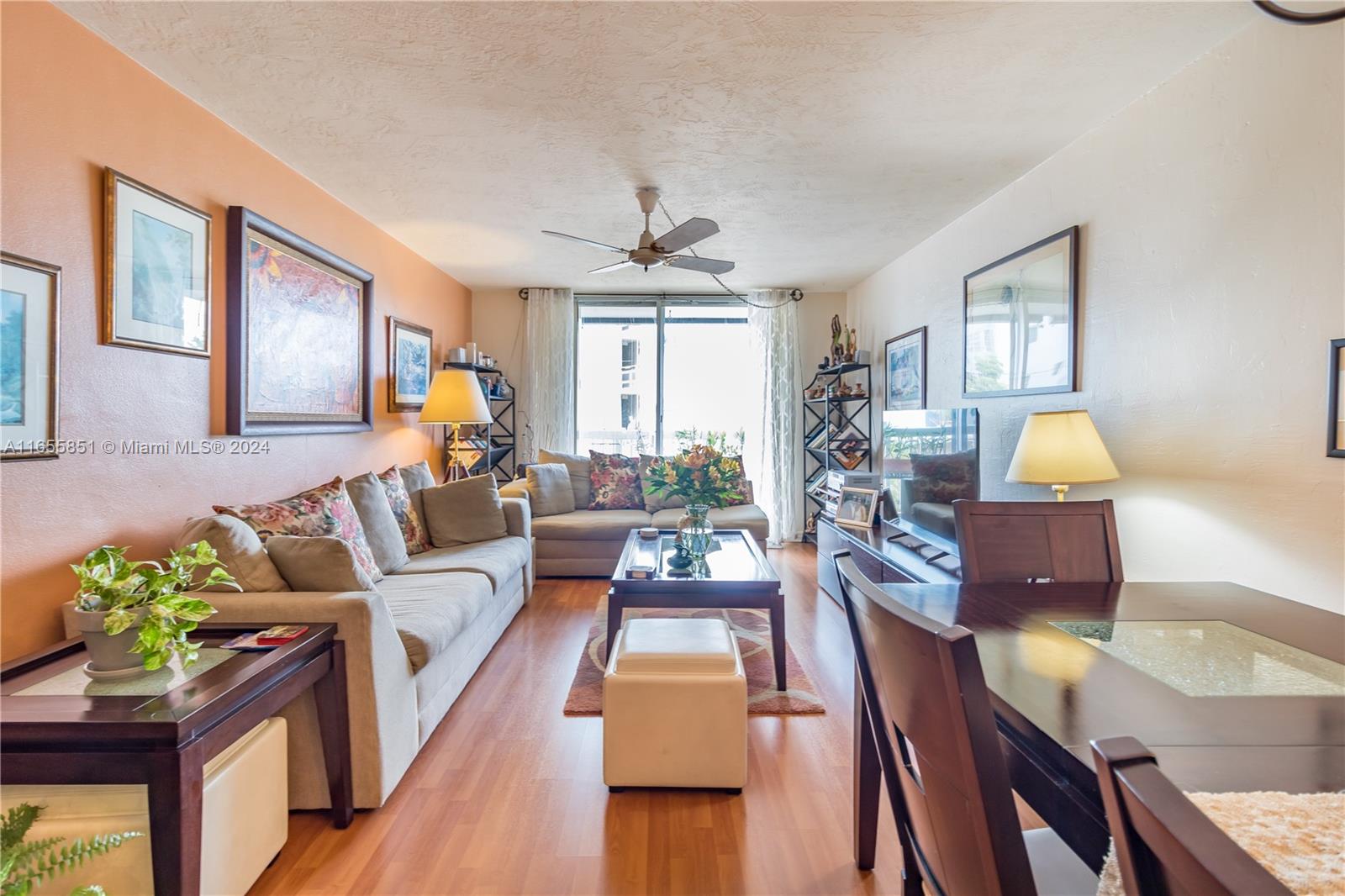 1670 Bay Road, Unit 2E Miami Beach, FL 33139 - Photo 2 of 27 Spacious living Dining area with west facing balcony