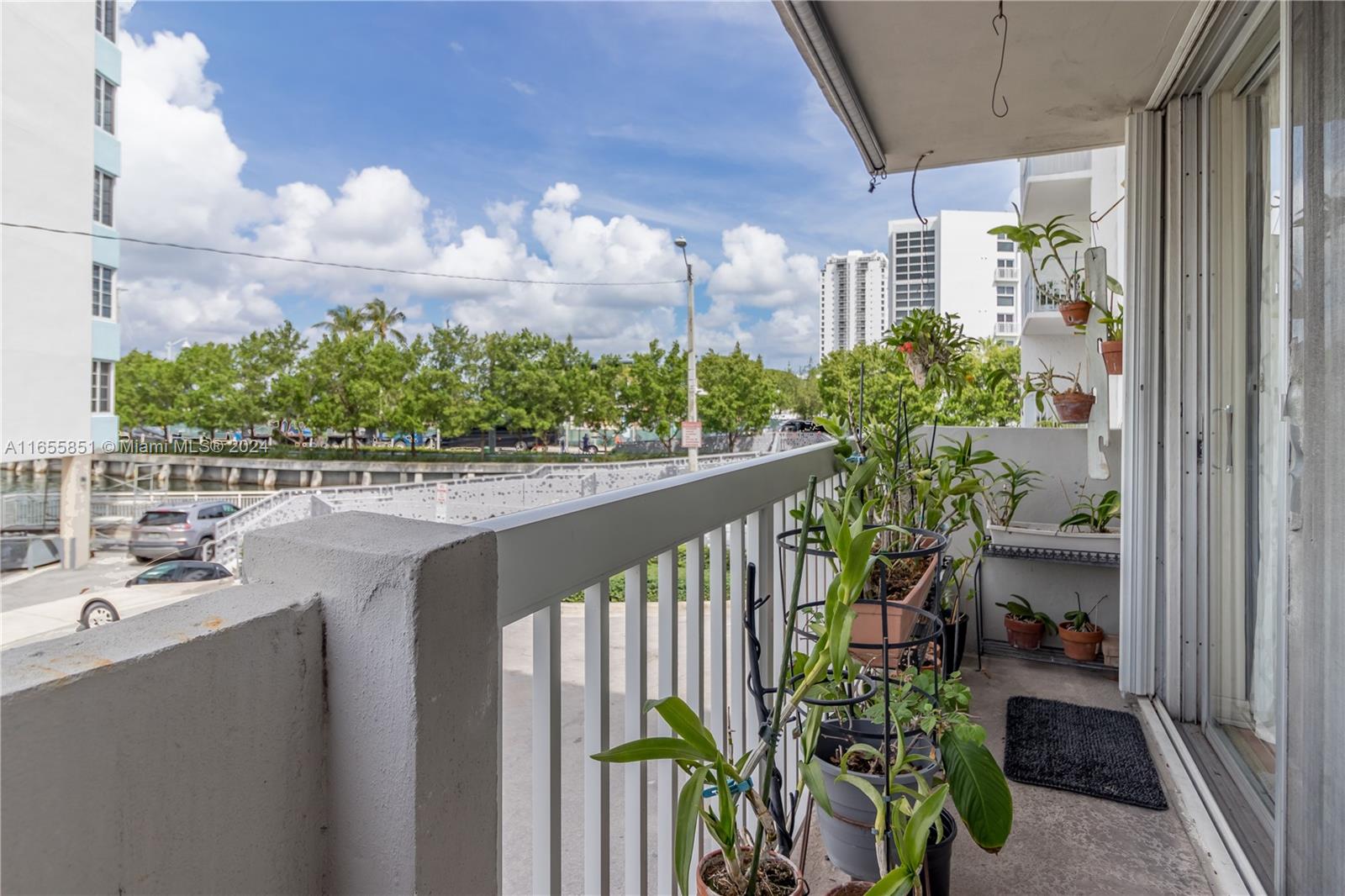 1670 Bay Road, Unit 2E Miami Beach, FL 33139 - Photo 6 of 27 balcony with views to Collins Canal